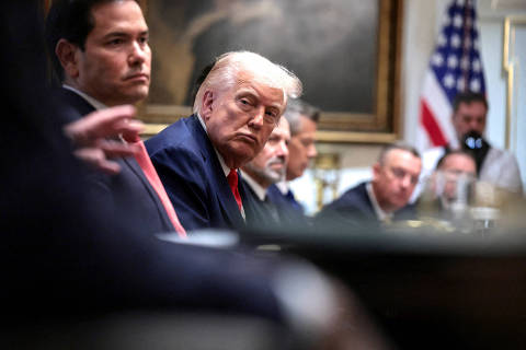 FILE PHOTO: U.S. President Donald Trump and Secretary of State Marco Rubio attend a cabinet meeting at the White House, in Washington, D.C., U.S., October 9, 2025. REUTERS/Evelyn Hockstein/File Photo ORG XMIT: FW1