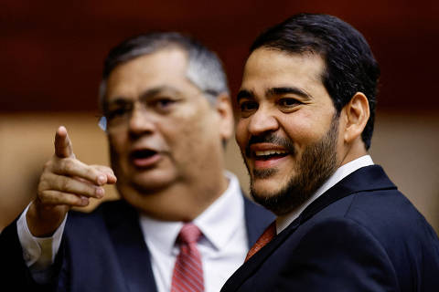 FILE PHOTO: Brazil's Minister of Justice Flavio Dino poses for a photo with Brazil's Attorney-General of the Union, Jorge Messias during an inauguration ceremony of the new President of Supreme Court, Roberto Barroso, in Brasilia, Brazil September 28, 2023. REUTERS/Ueslei Marcelino/File Photo ORG XMIT: FW1